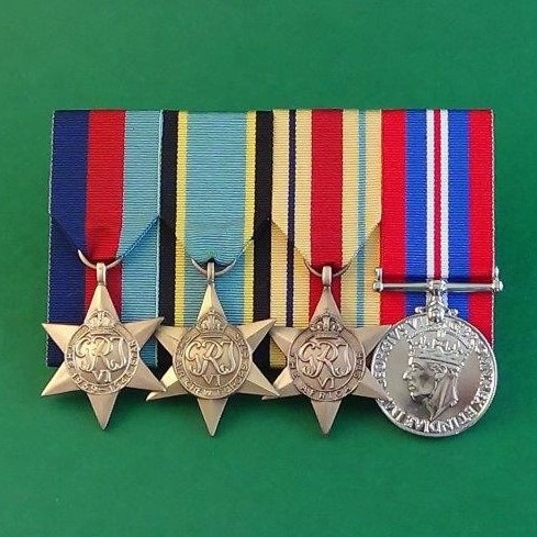 Photo of a full set of medals, miniatures and ribbons